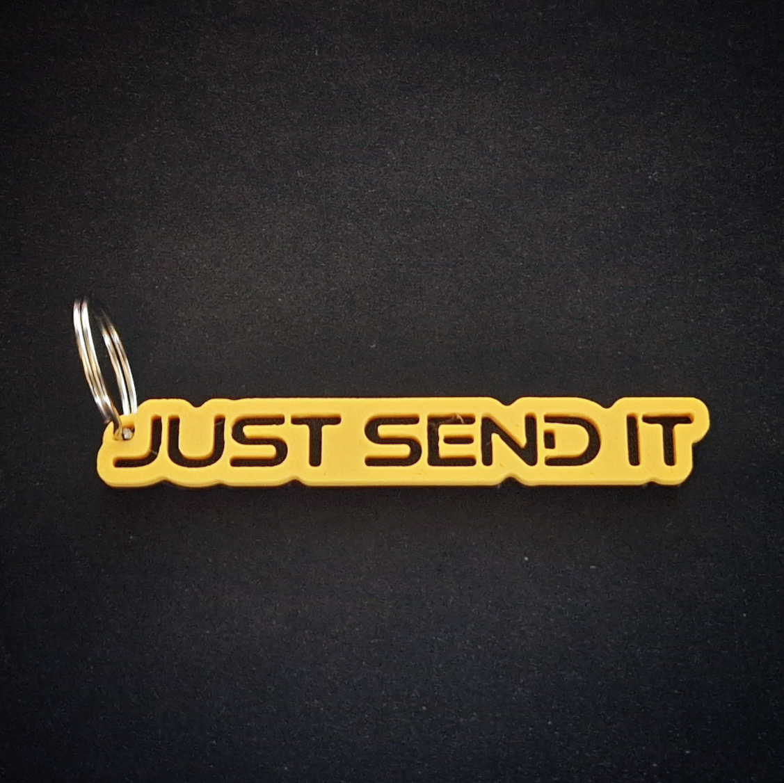 yellow just send it keychain car accessory