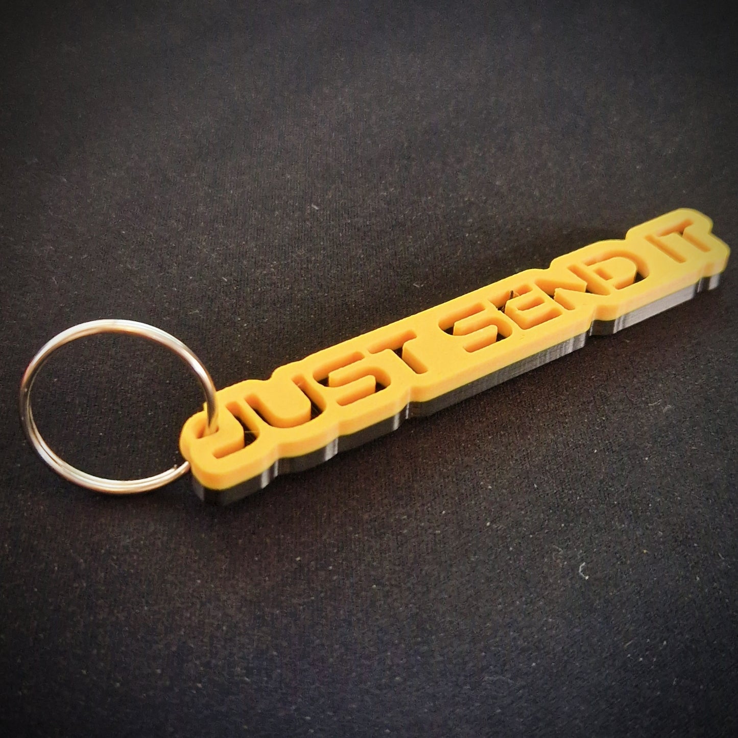 yellow and black just send it car keyring